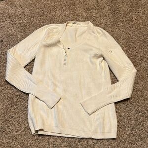 Athleta women’s button neck close to a waffle knit top